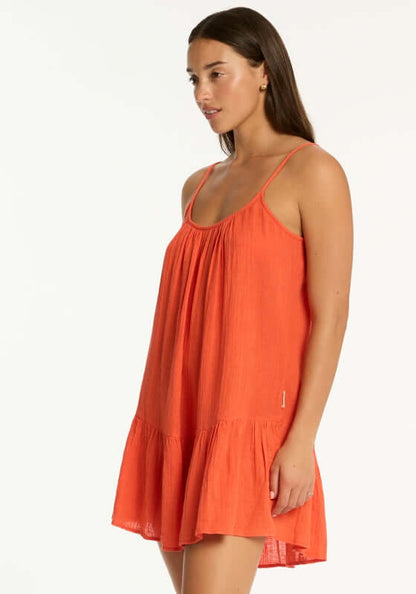 Sunset Short Beach Dress Flame by Sea Level, a chic red flame beach dress featuring a relaxed fit and tiered hem.