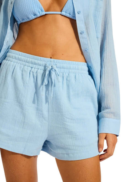 Crinkle Short Cornflower Blue by Seafolly model wearing soft crinkle cotton shorts with elasticated waist and side pockets.
