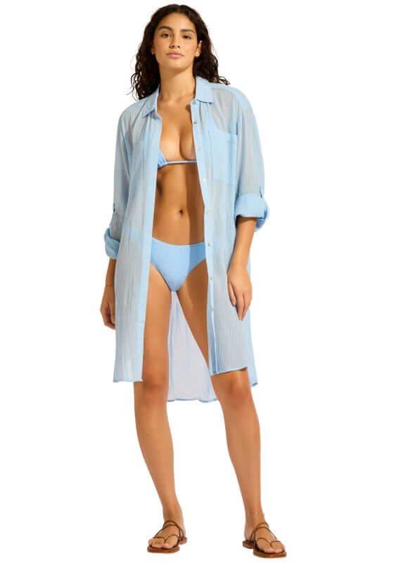 Crinkle Twill Beach Shirt Cornflower Blue by Seafolly, styled over swimwear for a relaxed beach-ready look.