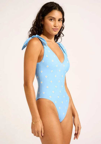 Daisy Chain V Neck Swimsuit by Seafolly, blue swimsuit with daisy print, deep V neckline, and playful tie straps.