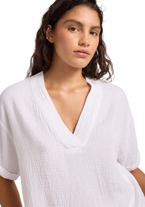 Double Gauze TV-Neck Top White by Seafolly, model wearing a white relaxed fit top with a TV-neck neckline.