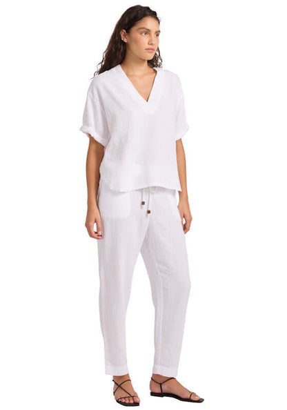 Double Gauze Tapered Beach Trouser by Seafolly, model wearing soft white trousers and top in a relaxed fit.