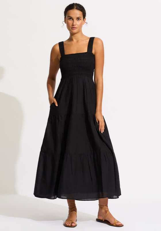 Faithful Midi Dress Black by Seafolly, featuring a smocked top, thick straps, and tiered midi skirt with pockets.