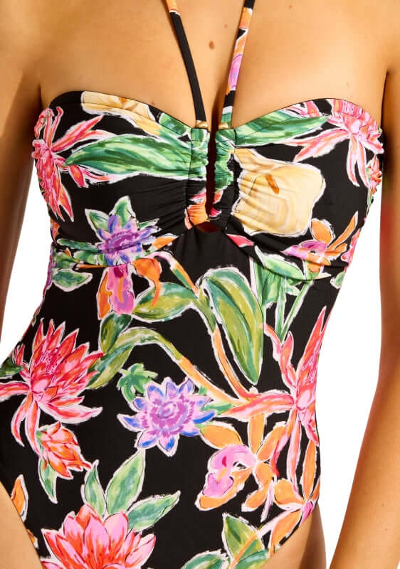 Black House of Flowers DD U Tube Swimsuit by Seafolly featuring vibrant floral patterns on a black background.