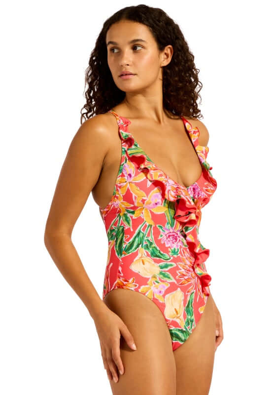 Melon House of Flowers Frill Swimsuit by Seafolly, featuring ruffled detailing and vibrant floral patterns.