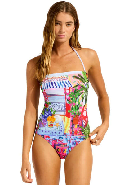 La Boca Bandeau Swimsuit by Seafolly on a model showcasing vibrant colors and placement print for beach days.