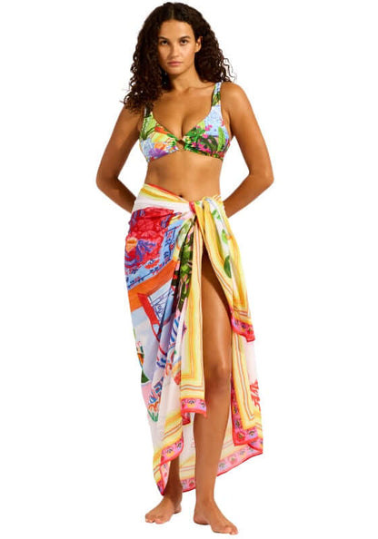 La Boca Sarong by Seafolly, model wearing a vibrant multicolored sarong as a beach cover-up.