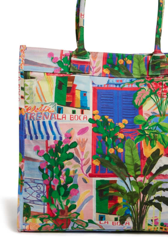 La Boca Tote Beach Bag by Seafolly, featuring colorful coastal prints and sturdy handles for beach essentials.
