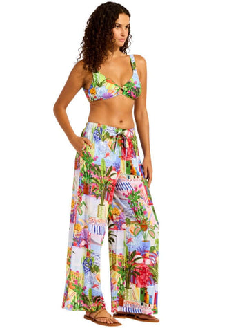 La Boca Wide Leg Beach Trousers by Seafolly, vibrant beach trousers model displays relaxed fit with floral patterns.