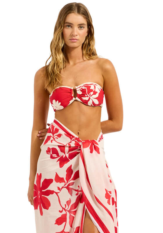 Mayflower Sarong Cosmo Red by Seafolly model wearing vibrant floral print sarong with red and ecru colors.
