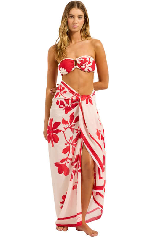Mayflower Sarong Cosmo Red by Seafolly model wearing a vibrant floral sarong over a bikini.
