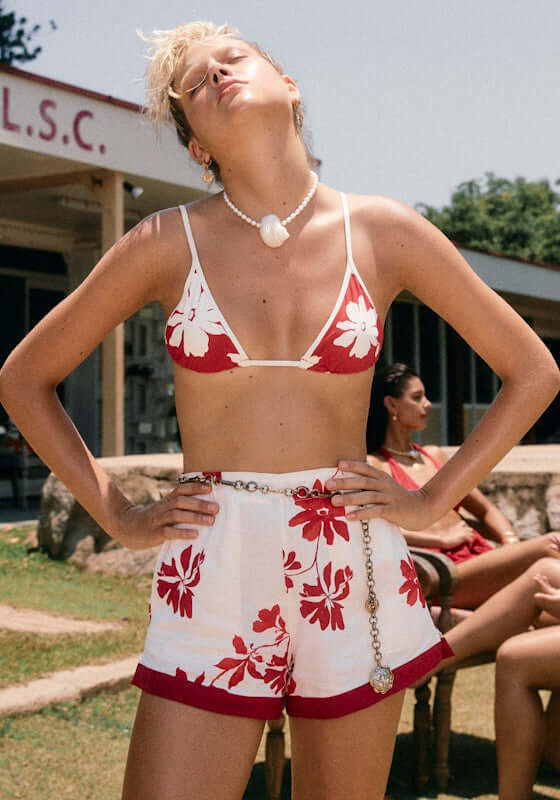 Mayflower Triangle Bikini Cosmo Red by Seafolly worn by a model, featuring red and white floral print with a classic triangle top.