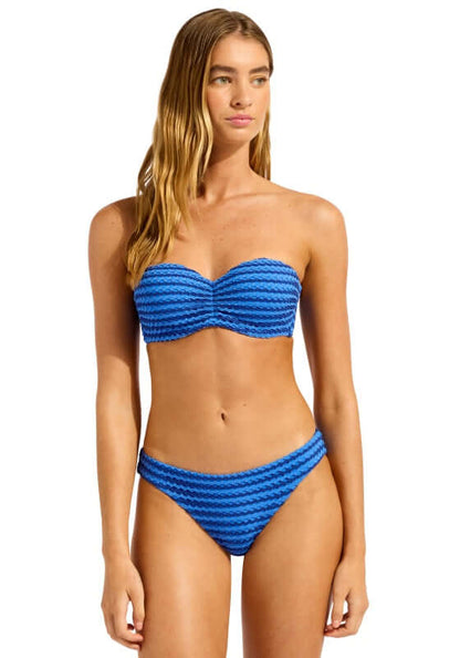 Mesh Effect Bandeau Bikini Sapphire by Seafolly. Model wearing blue bandeau bikini, highlighting its stylish design and fit.