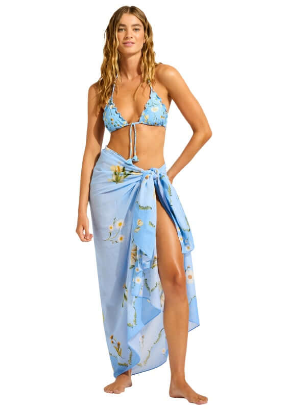 Modern Romance Sarong Powder Blue by Seafolly, a model showcases the bold print sarong styled elegantly.