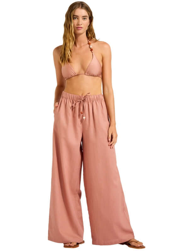 Palermo Wide Leg Beach Trousers Mocha by Seafolly model wearing wide leg beach trousers with a relaxed fit.
