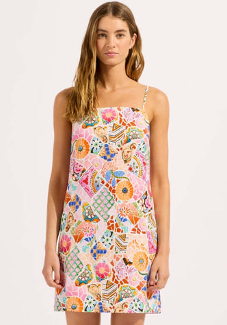 Boheme Bandeau Mini Dress Parfait Pink by Seafolly, featuring colorful patterns and delicate spaghetti straps.