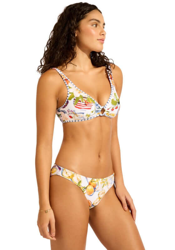 Riviera Coast Ring Front Tank Bikini by Seafolly worn by a model, featuring colorful fruit patterns and a stylish design.