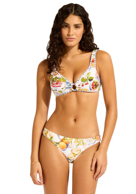 Riviera Coast Ring Front Tank Bikini by Seafolly model showing colorful fruit print design with soft cups and regular coverage.