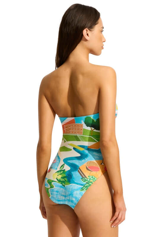 Sunset DD Bandeau Swimsuit by Seafolly, showcasing a vibrant design from the back view on a model.