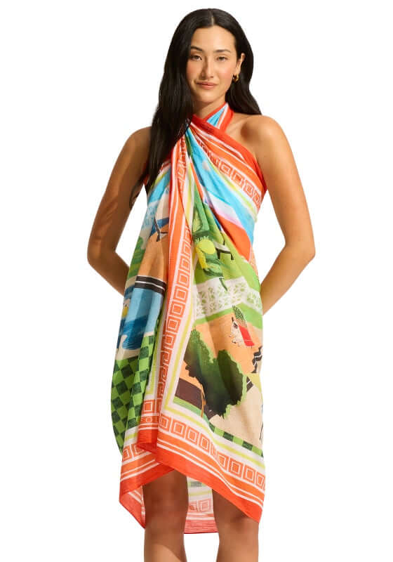 Sunset Sarong by Seafolly, showcasing a vibrant aquatic print, styled elegantly as a beach cover-up.