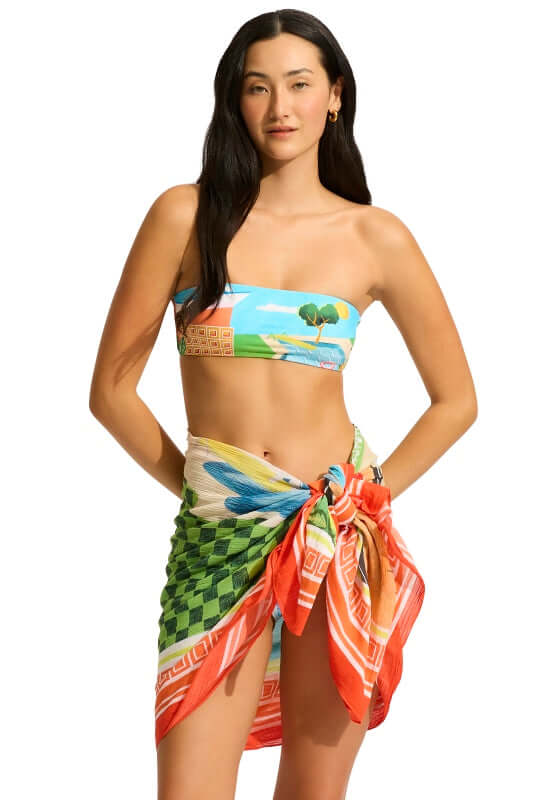 Sunset Sarong by Seafolly, featuring a model wearing a colorful sarong with a vibrant aquatic print.