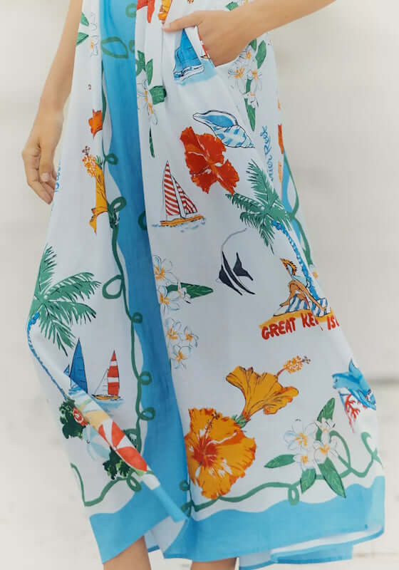 Viva Vacation Maxi Dress by Seafolly, featuring a vibrant print with floral and nautical designs, perfect for beach outings.
