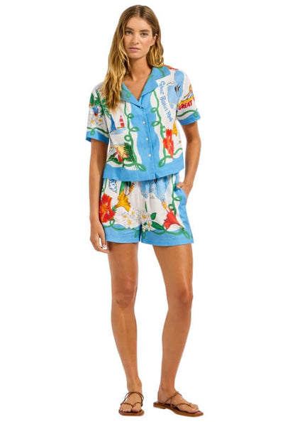 Viva Vacation Beach Shorts by Seafolly, featuring a vibrant postcard print on a stylish summer outfit.