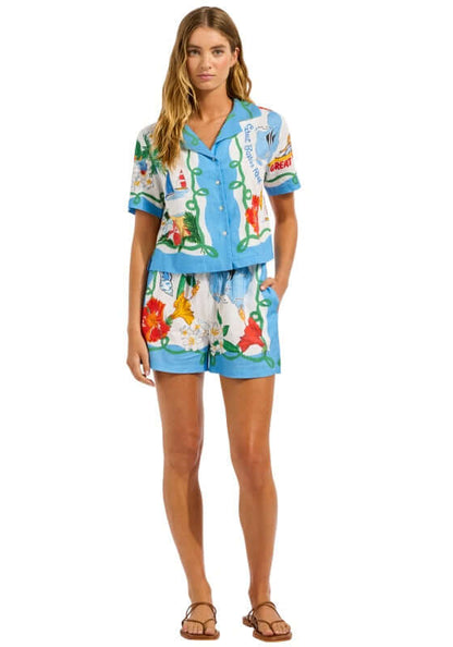 Viva Vacation Beach Shorts by Seafolly model wearing colorful tropical print beach shorts and matching shirt, perfect for summer.