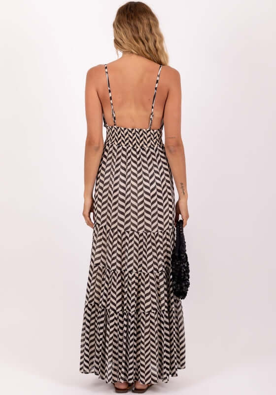 Ditta Dress Black and White by Sundress, back view showcasing the tiered design and flattering fit.