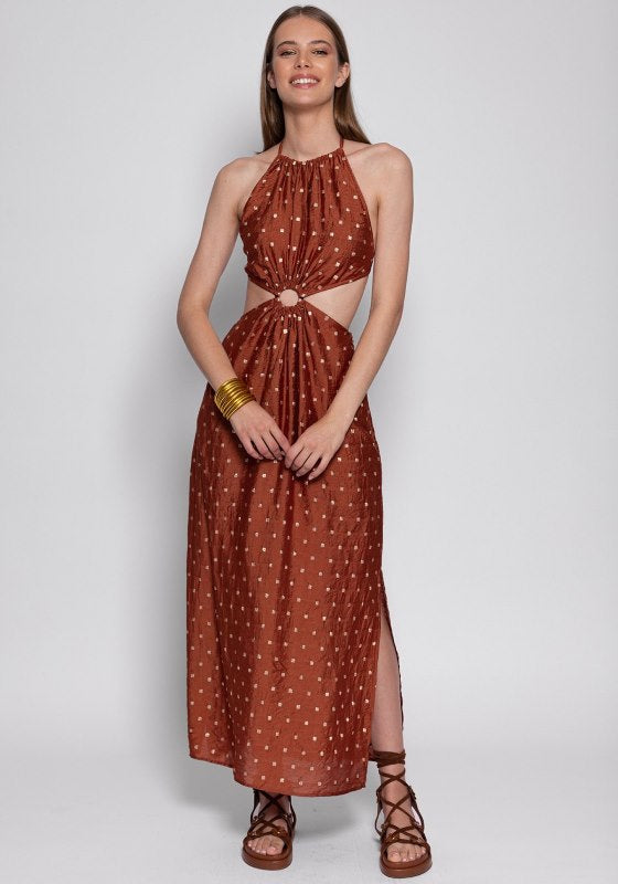 Filiza Dress by Sundress model in brown and gold polka dot print with cut out sides and ring detail.