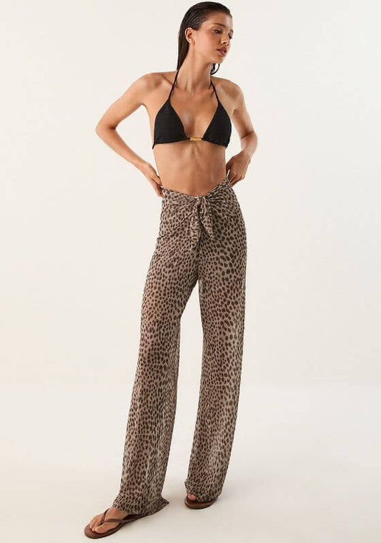 Pareo Beach Trousers Barths by Vix Swimwear model in animal print trousers, perfect beachwear for resort style.