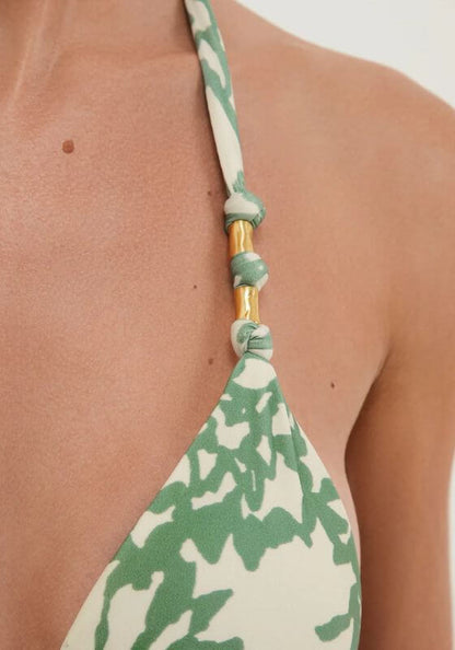 Paula Bikini Oceana by Vix featuring unique knots and bead details on the bikini strap in a green and white pattern.